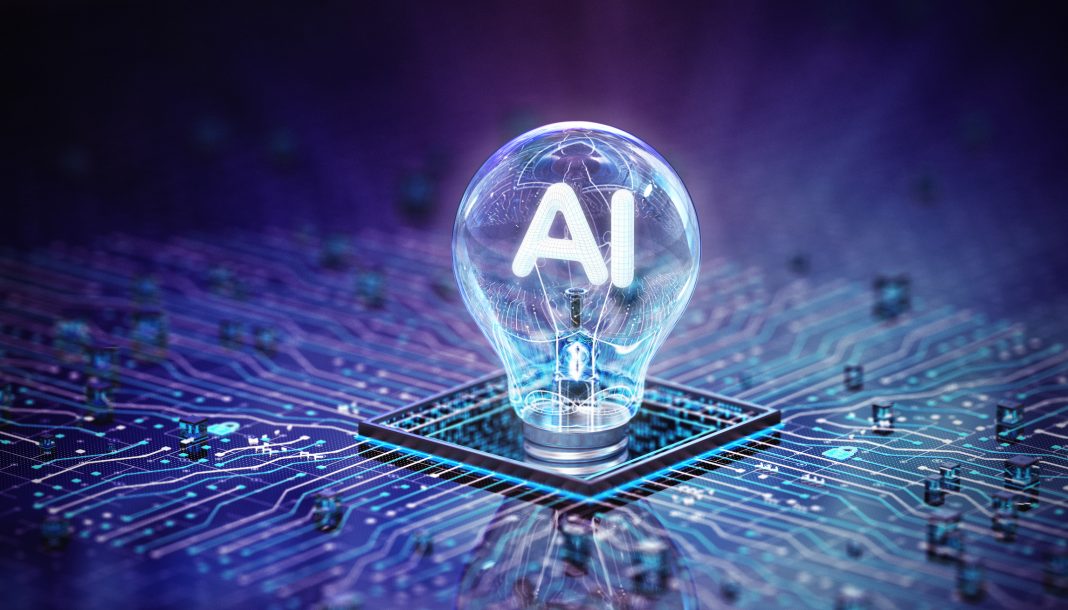 Light bulb with AI letters on a circuit board