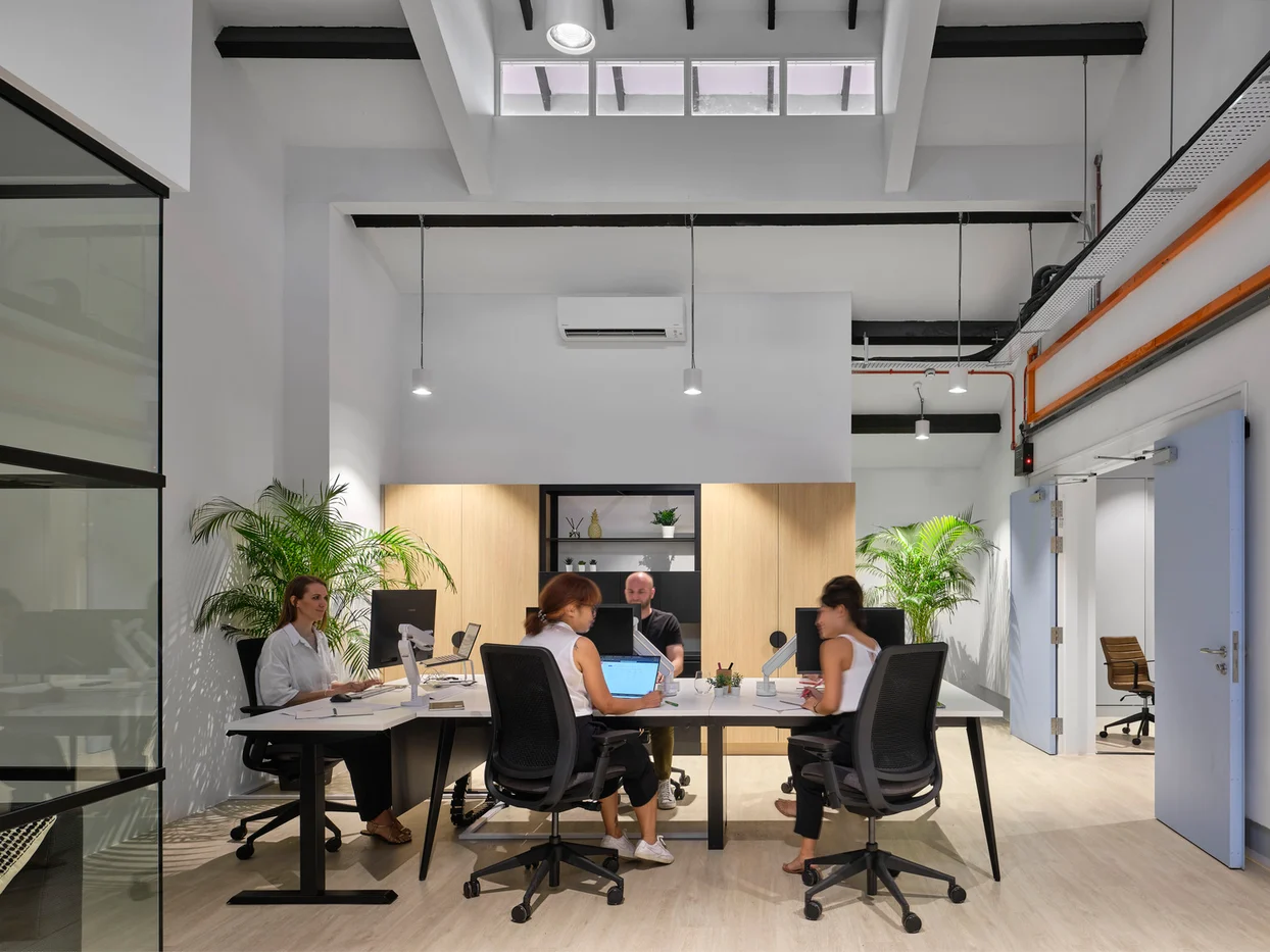Team talking in a studio workspace